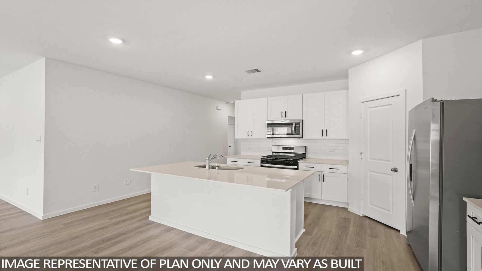 kitchen with quartz countertops and stainless steel appliances