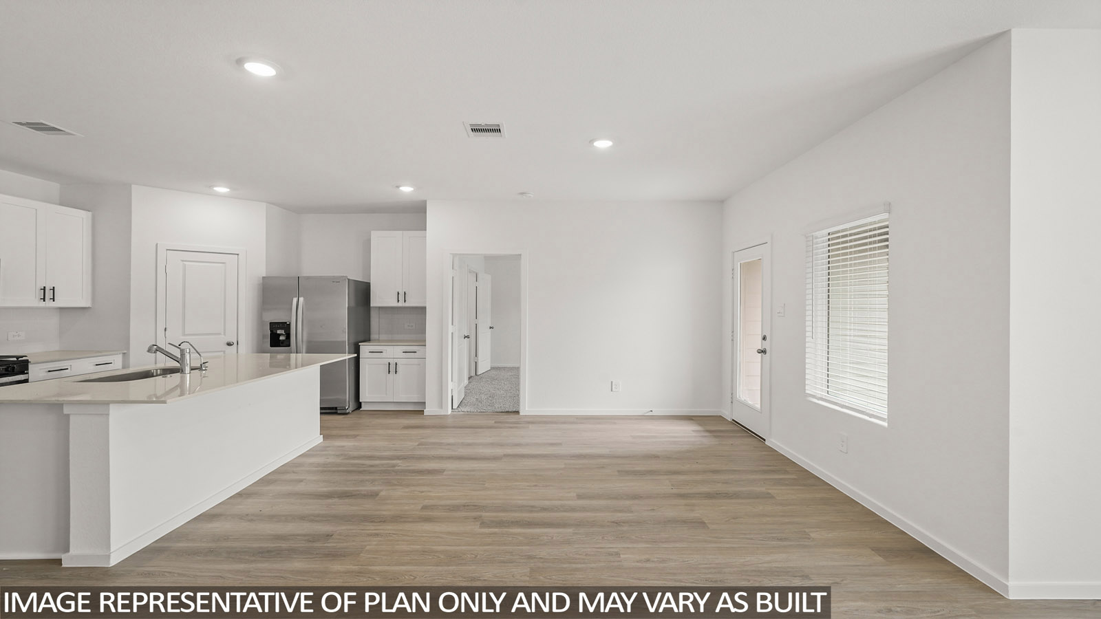 open concept living and dinnig area with vinyl flooring and large windows