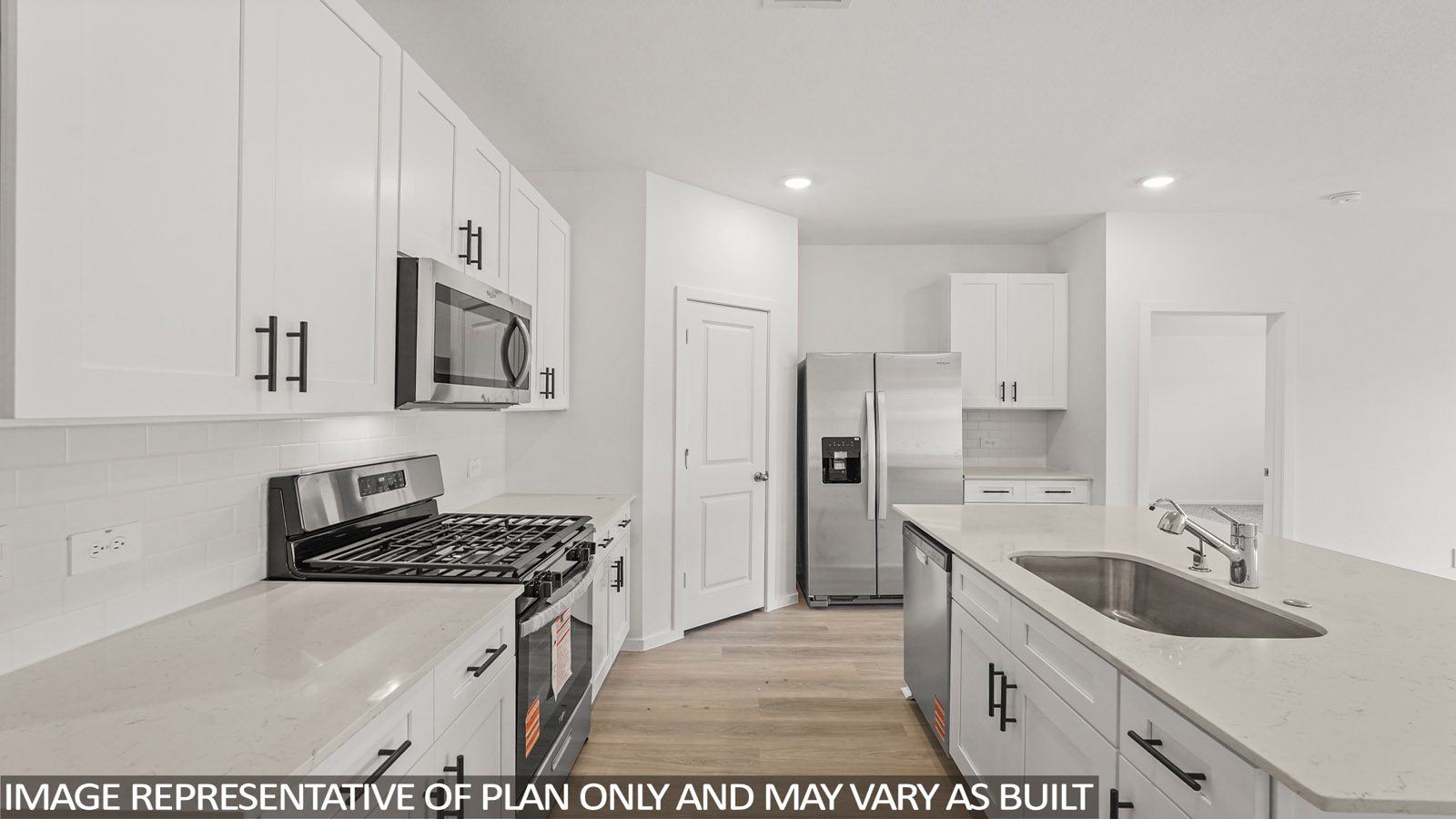 kitchen with quartz countertops and stainless steel appliances