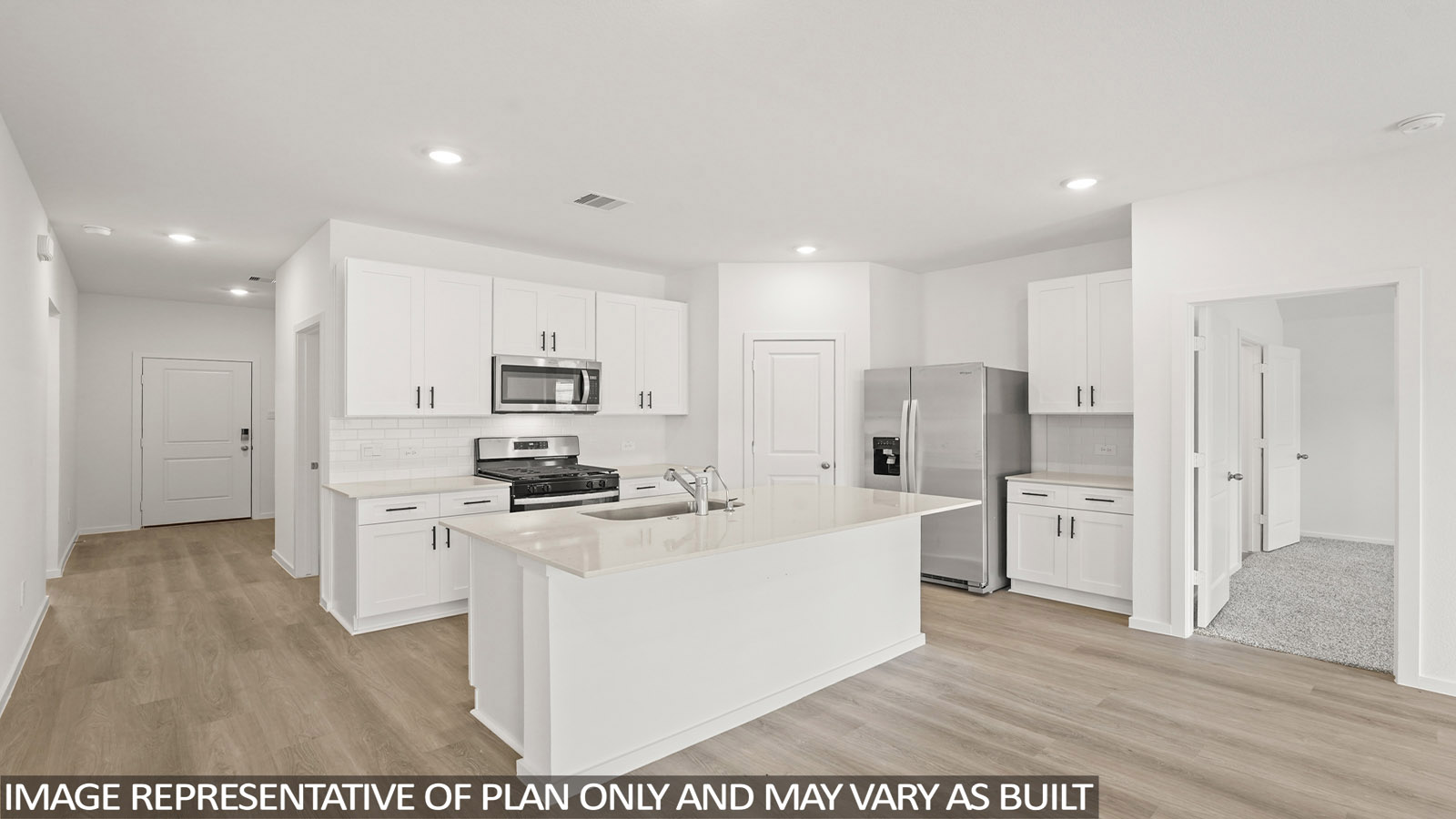 kitchen with quartz countertops and stainless steel appliances