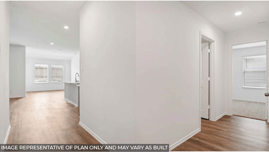 hallway with vinyl flooring