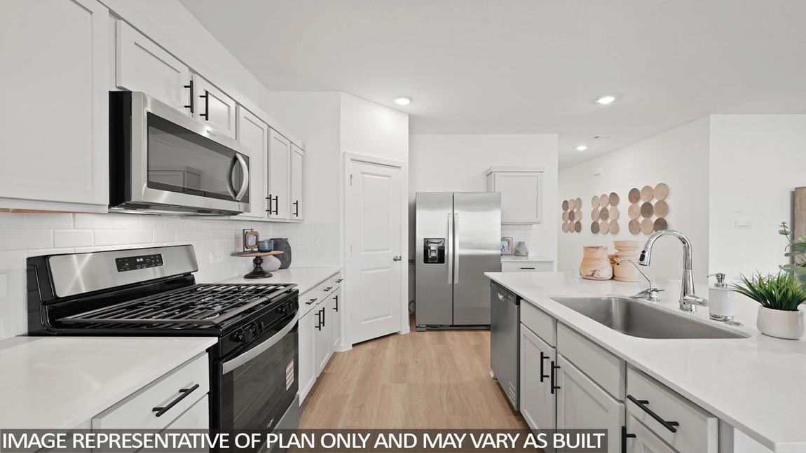 open concept living and dining area with vinyl flooring and quartz countertops