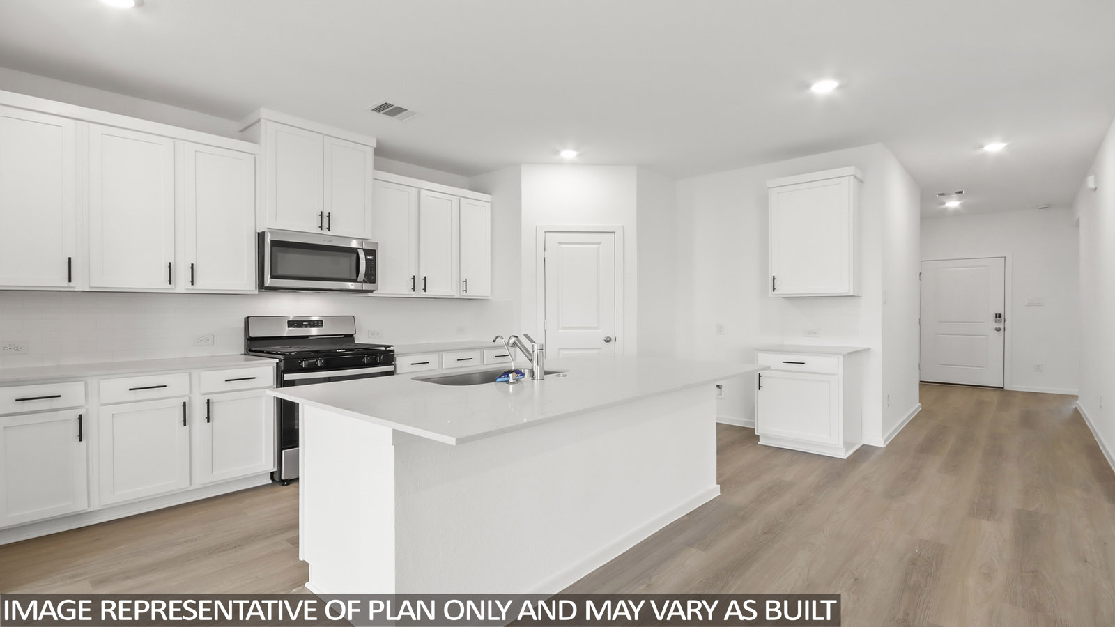 open concept living and dining area with vinyl flooring, large windows, and quartz countertops