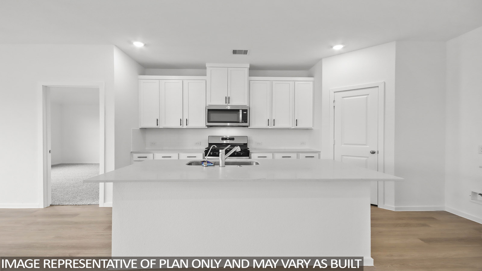open concept living and dining area with vinyl flooring, large windows, and quartz countertops