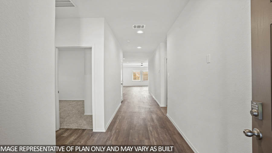 Entry hallway with vinyl flooring