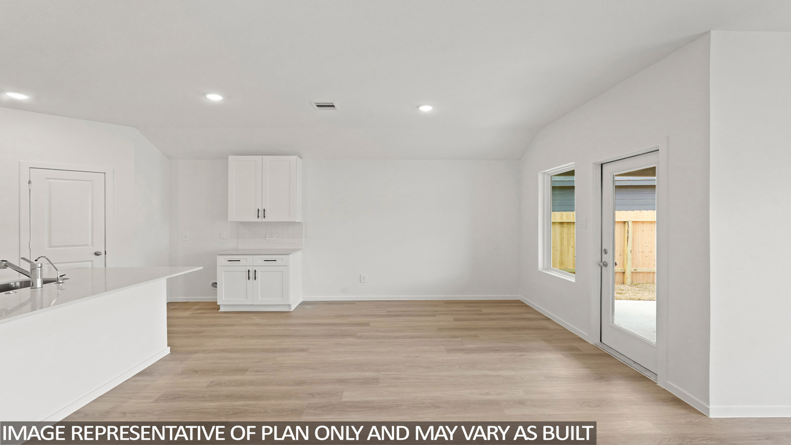 open concept living and dining area with vinyl flooring and large windows