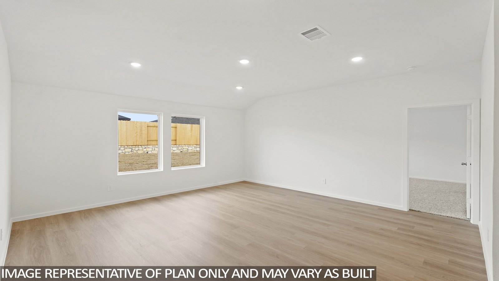 open concept living and dining area with vinyl flooring and large windows