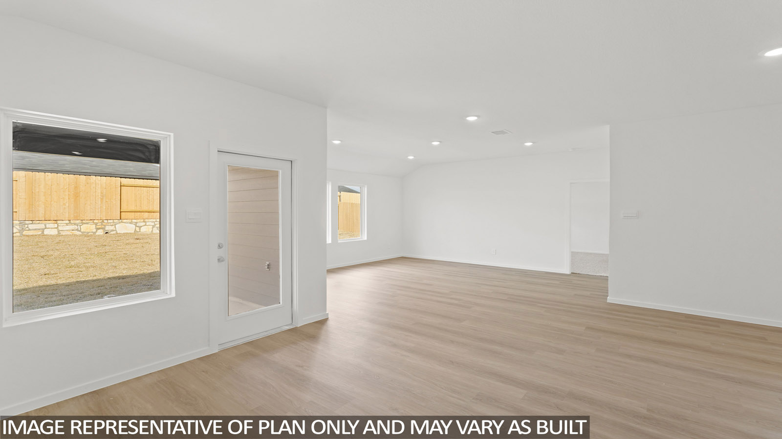open concept living and dining area with vinyl flooring and large windows