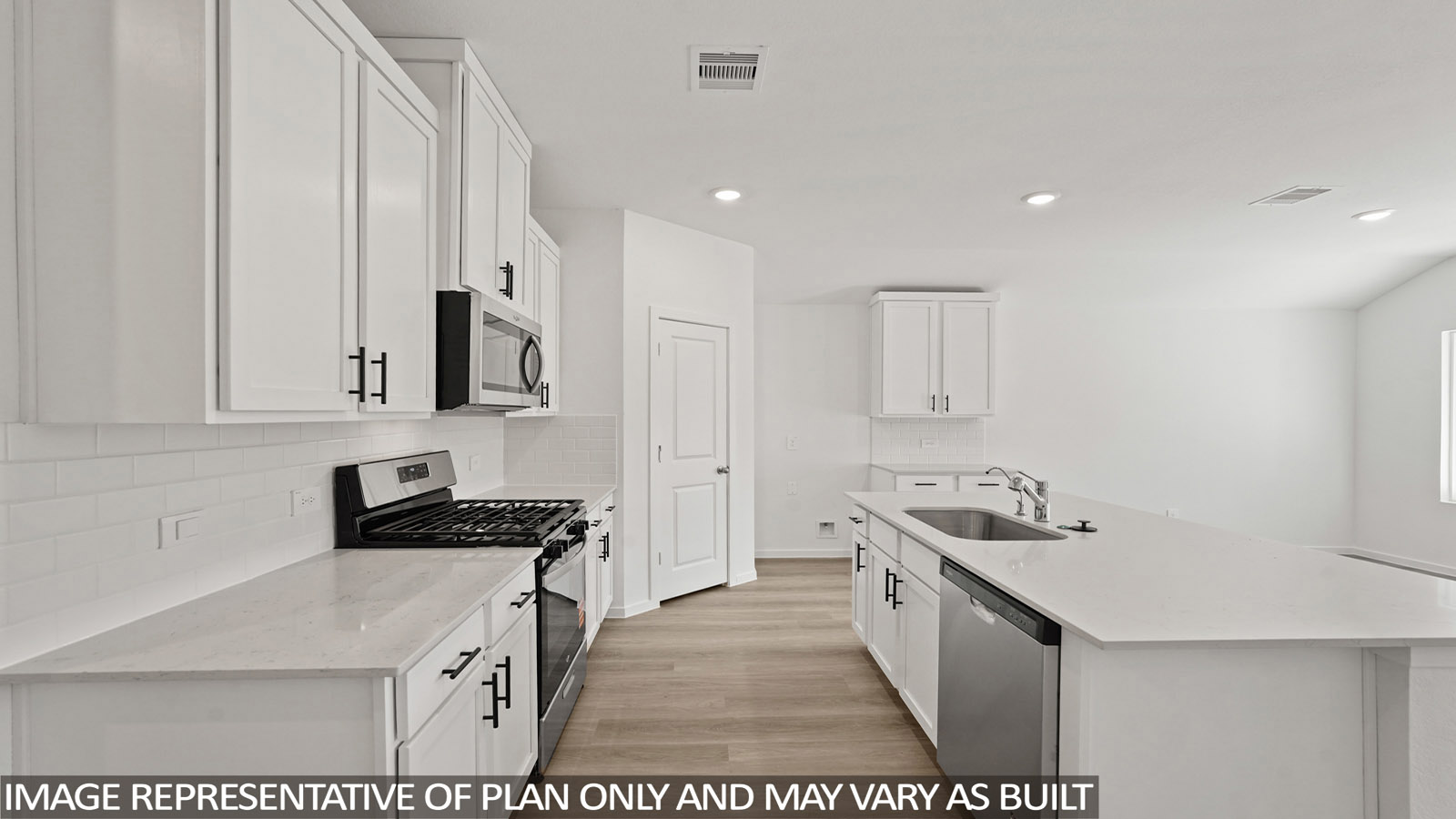 open concept living and dining area with vinyl flooring, large windows, and quartz countertops