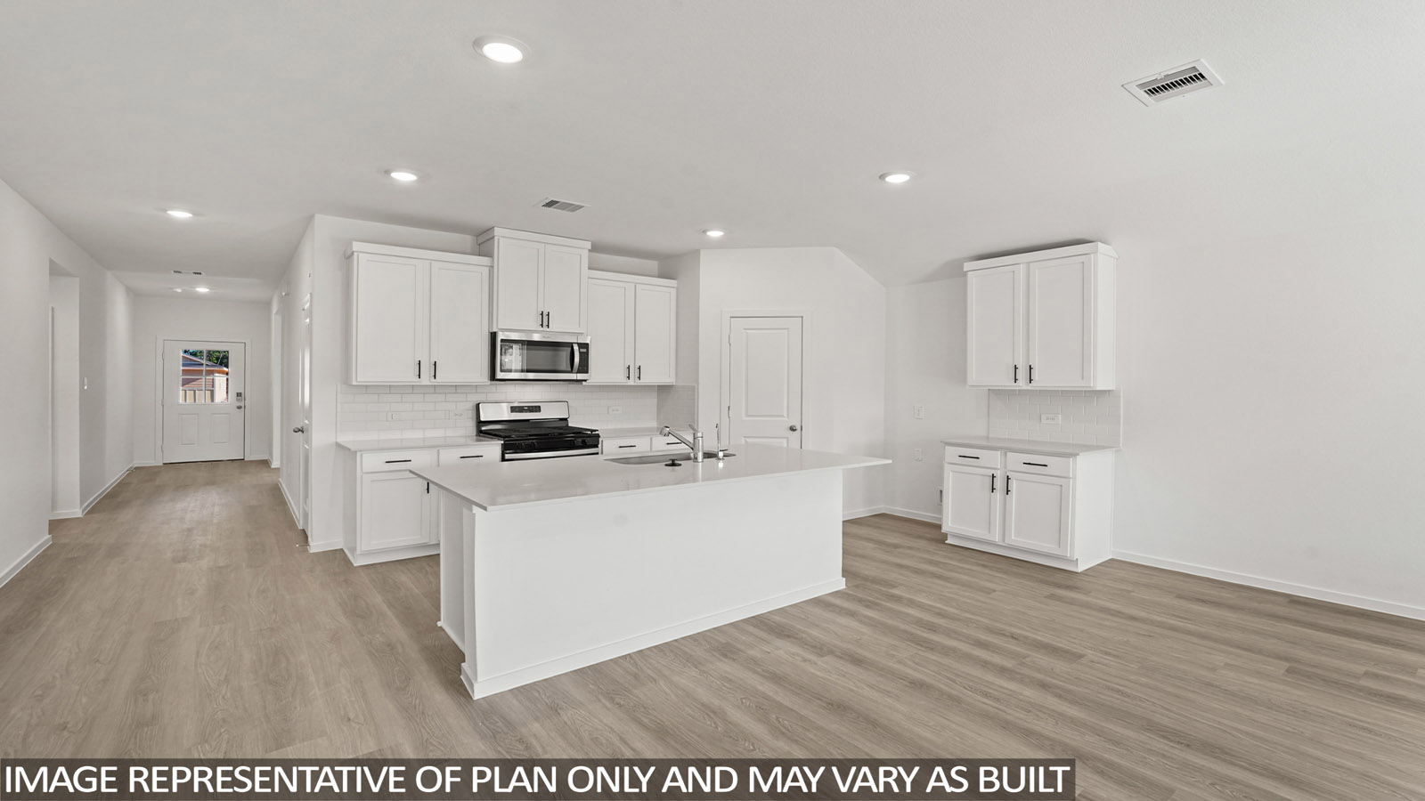 open concept living and dining area with vinyl flooring, large windows, and quartz countertops