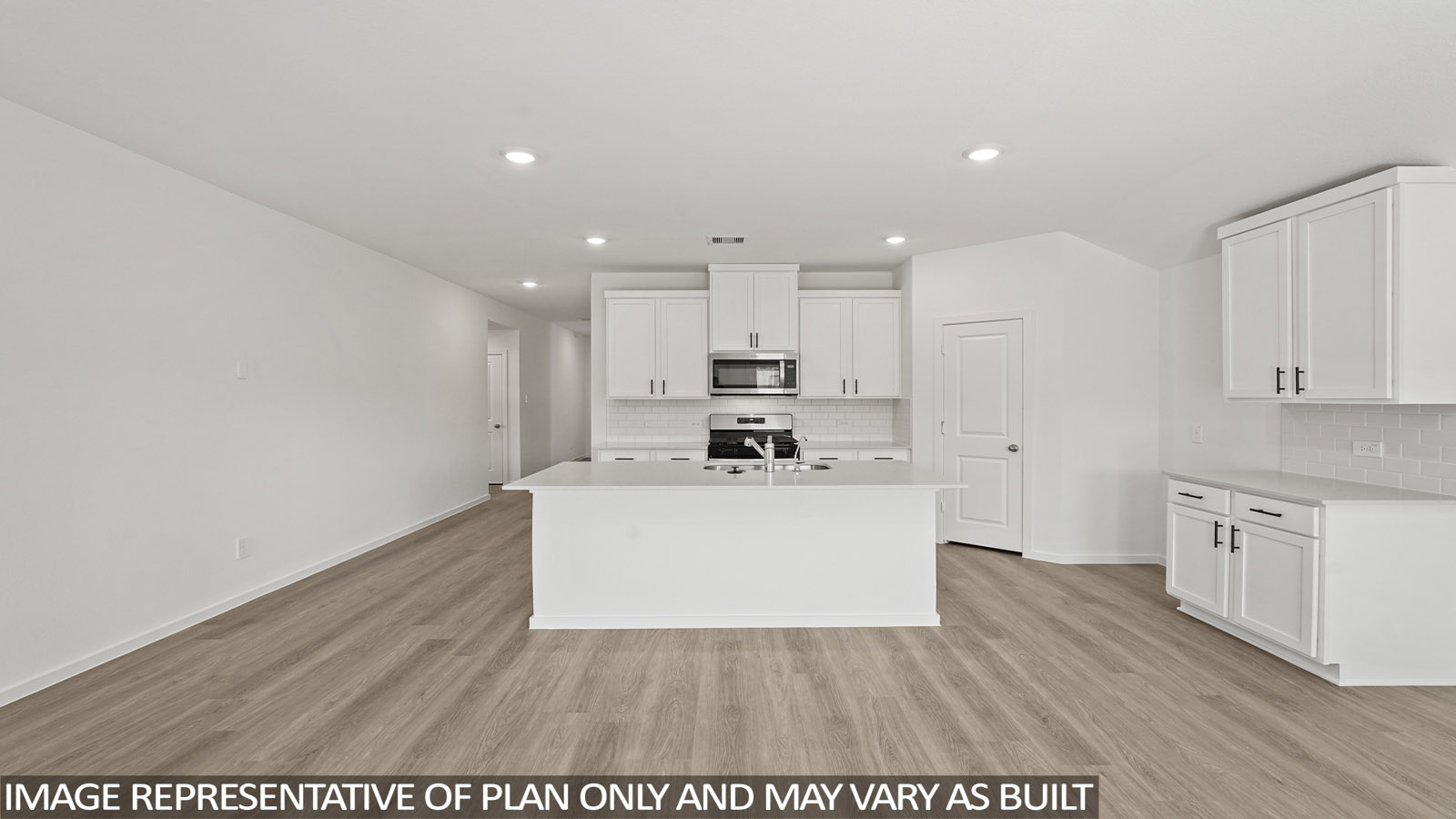 open concept living and dining area with vinyl flooring, large windows, and quartz countertops