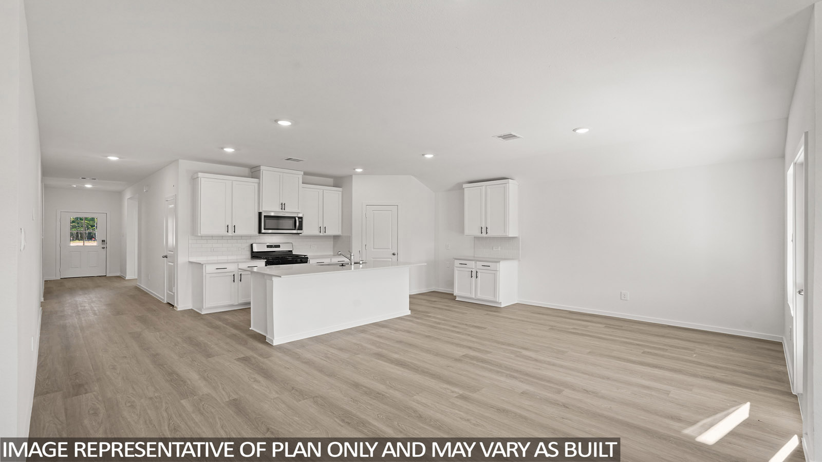 open concept living and dining area with vinyl flooring, large windows, and quartz countertops