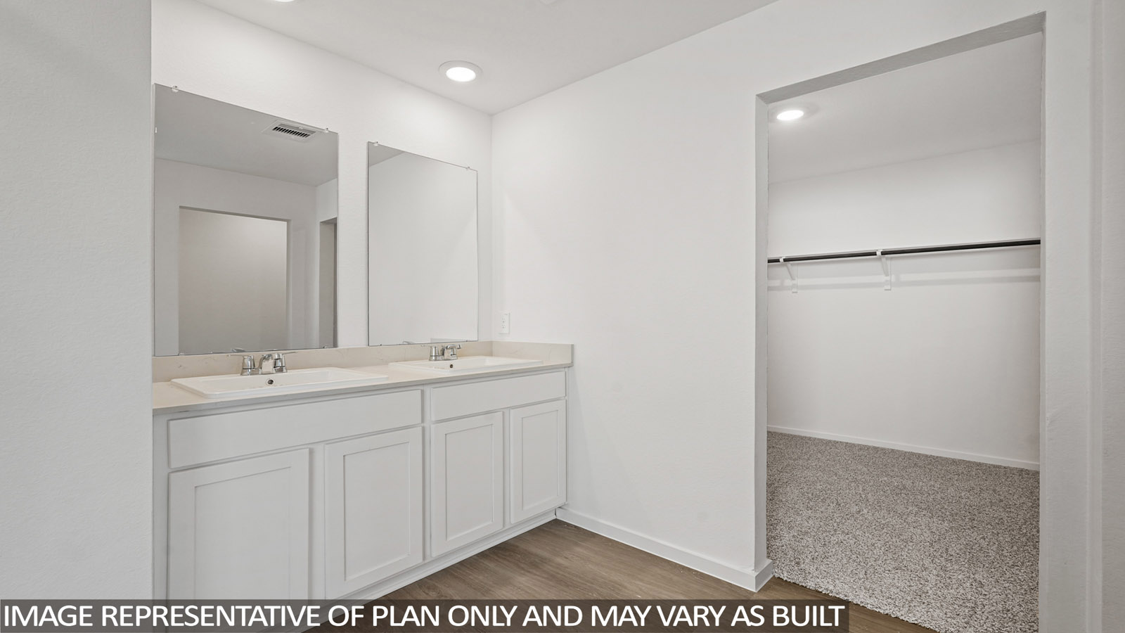 primary bathroom with separate tub and shower
