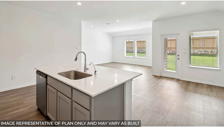 open concept living and dining area with vinyl flooring, large windows, and quartz countertops