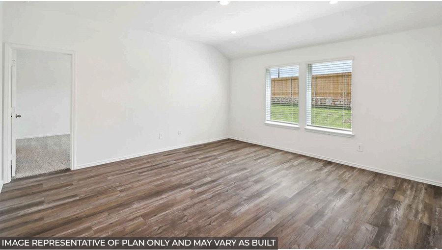 open concept living and dining area with vinyl flooring, large windows, and quartz countertops