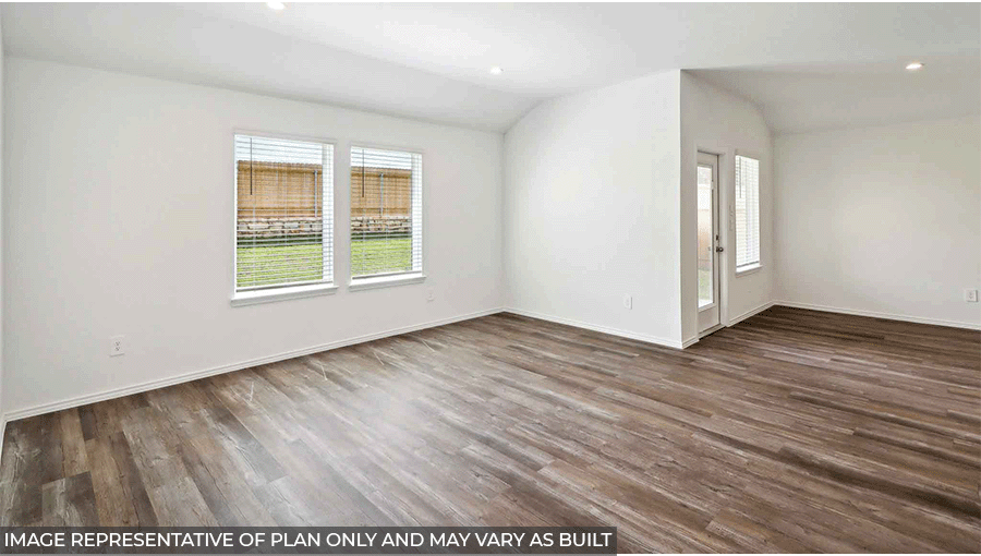 open concept living and dining area with vinyl flooring, large windows, and quartz countertops