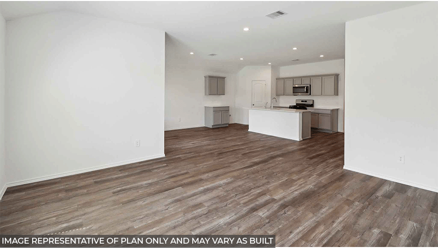 open concept living and dining area with vinyl flooring, large windows, and quartz countertops