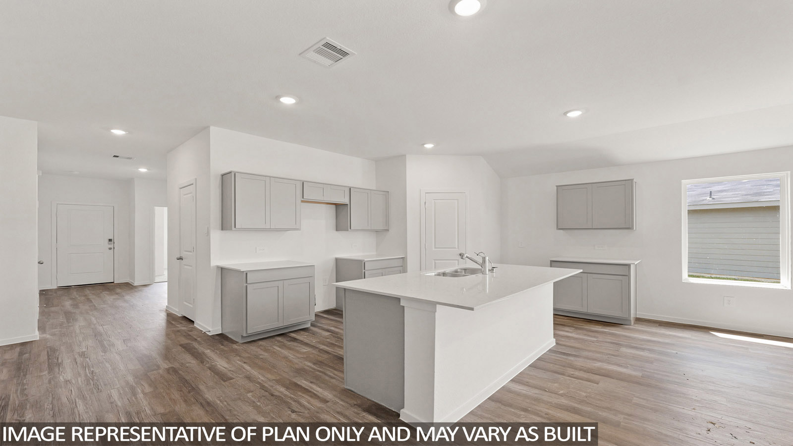 open concept living and dining area with vinyl flooring, quartz countertops, and large windows