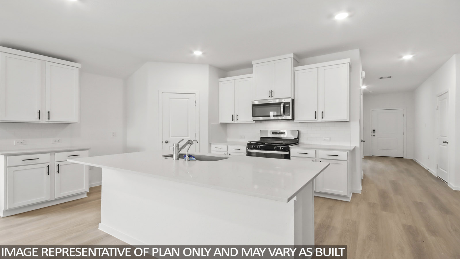 open concept living and dining area with vinyl flooring, large windows.