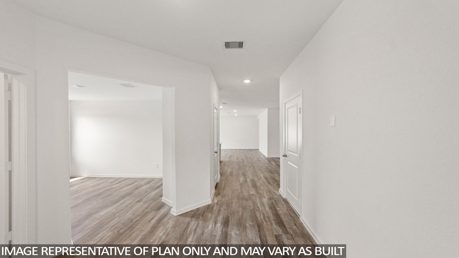 open concept living and dining area with vinyl flooring, large windows