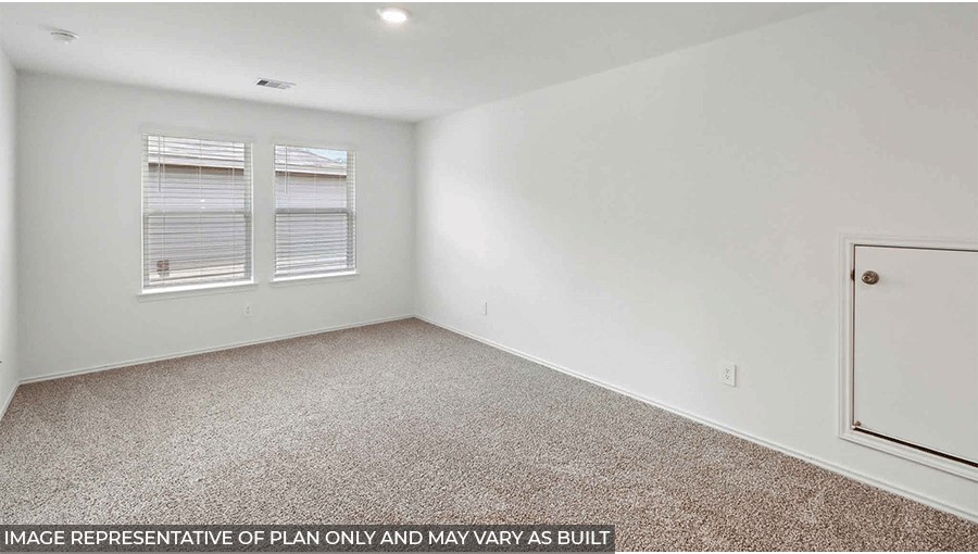 bedroom with carpet flooring and windows
