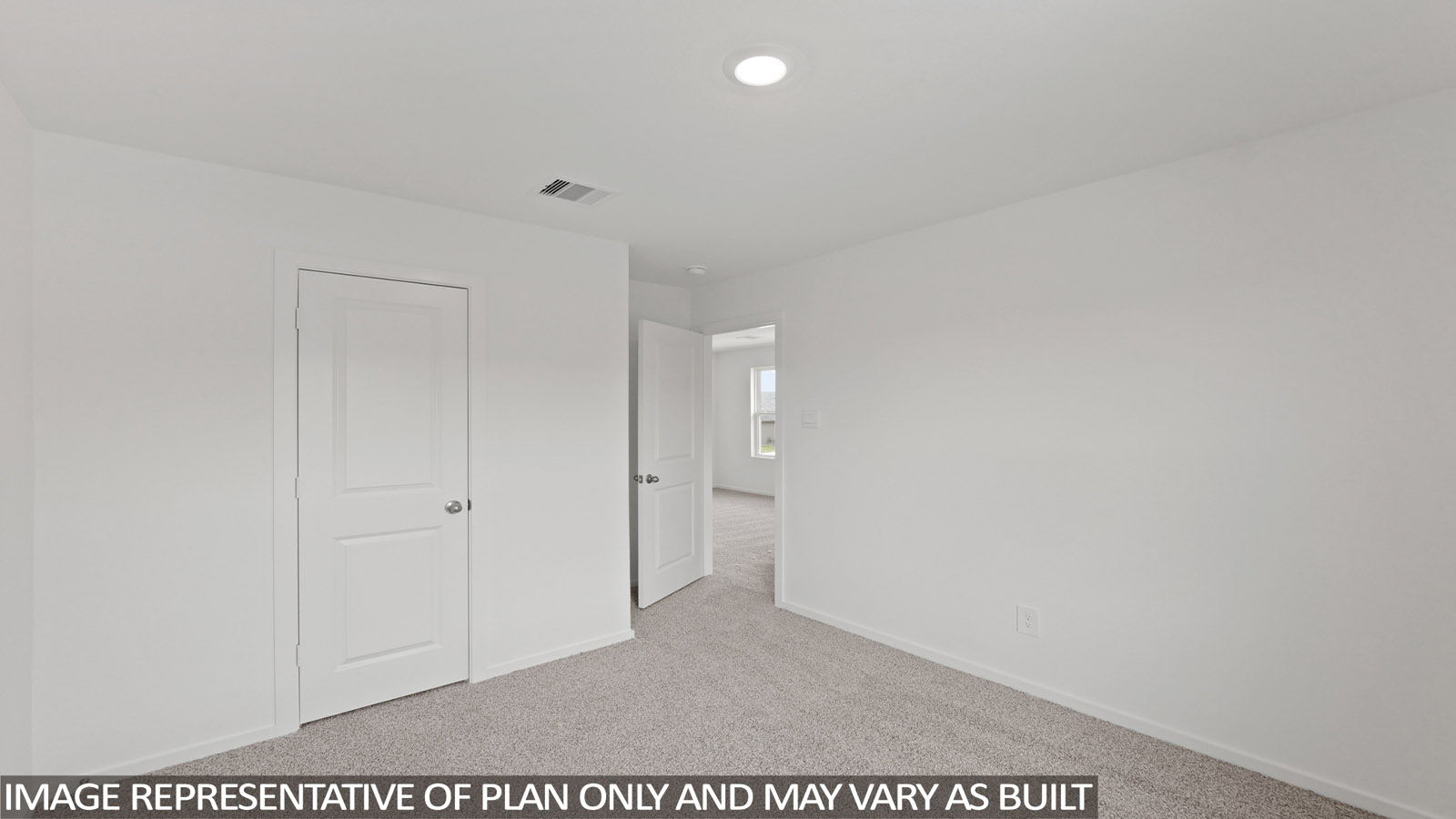 Bedroom with carpet flooring