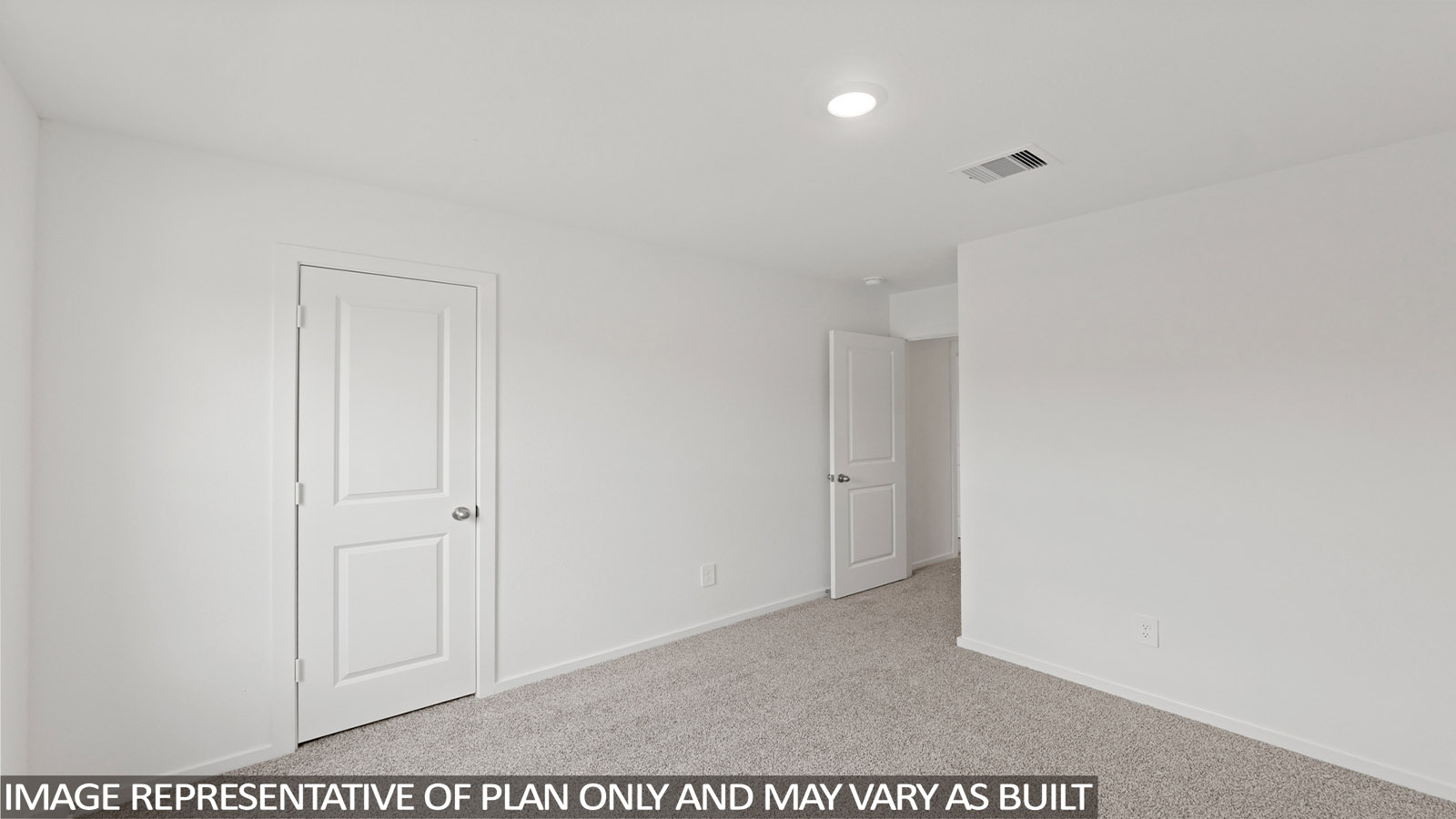 Bedroom with carpet flooring