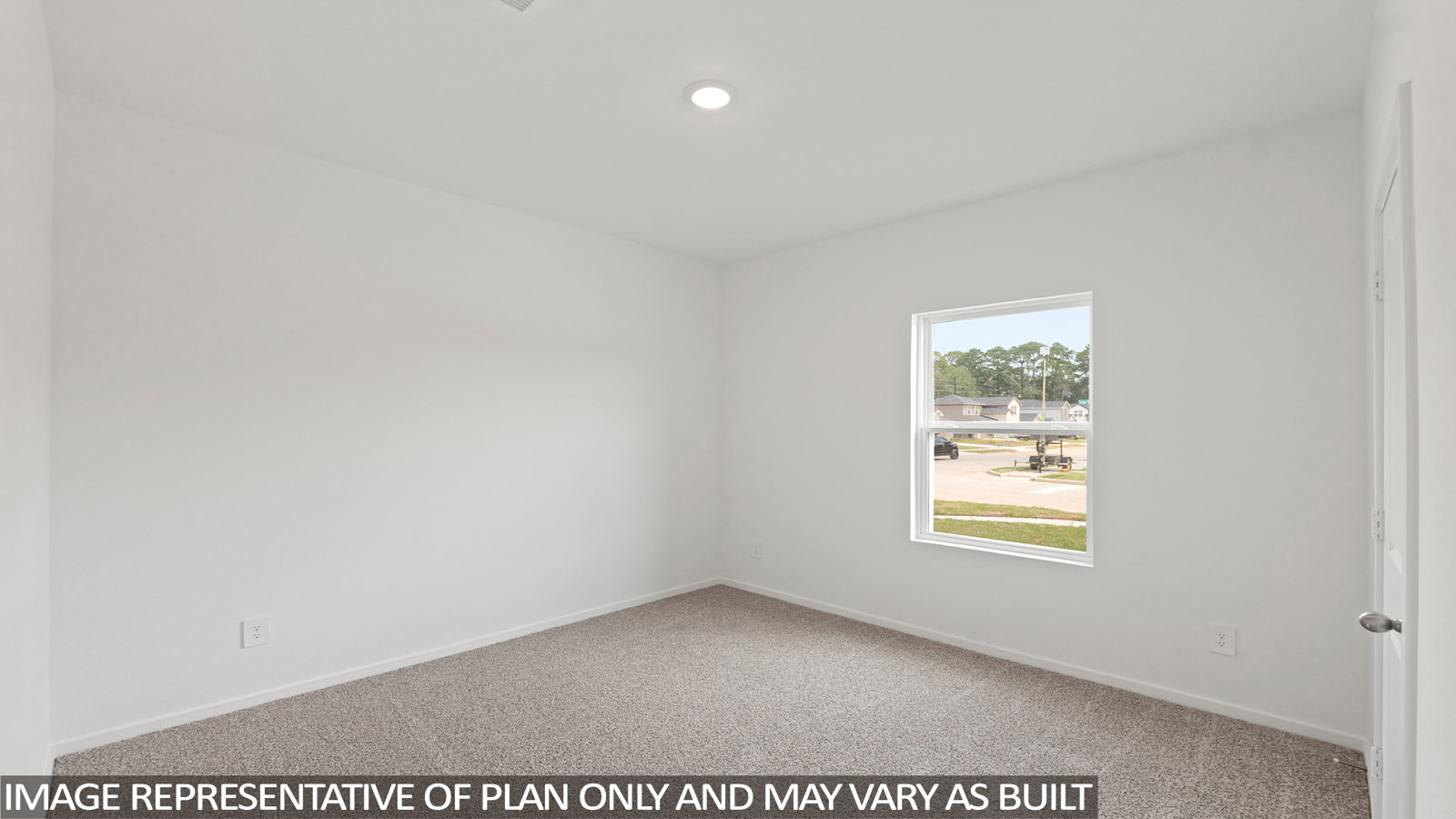 Bedroom with carpet flooring