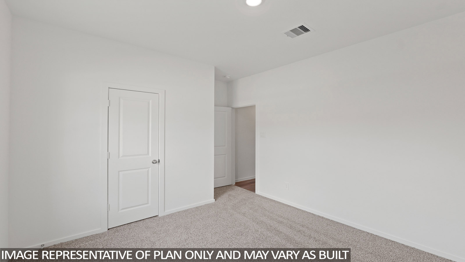 Bedroom with carpet flooring