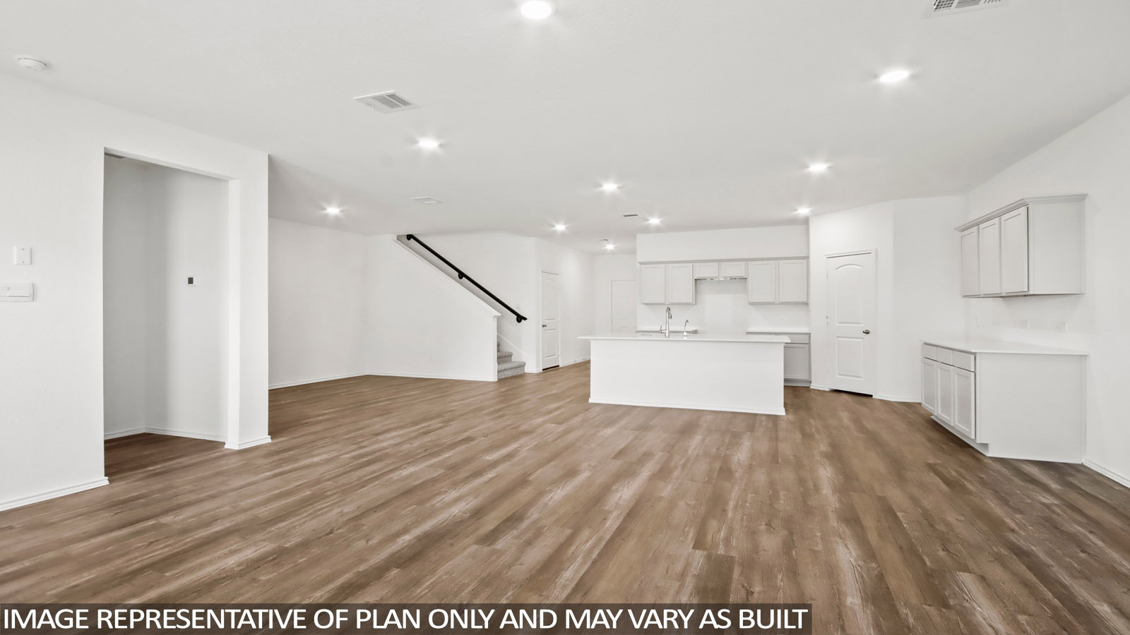 open concept living and dining area with vinyl flooring, large windows, and quartz countertops