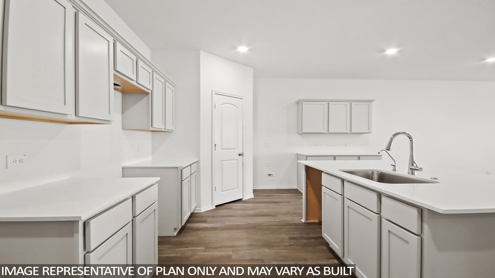open concept living and dining area with vinyl flooring, large windows, and quartz countertops