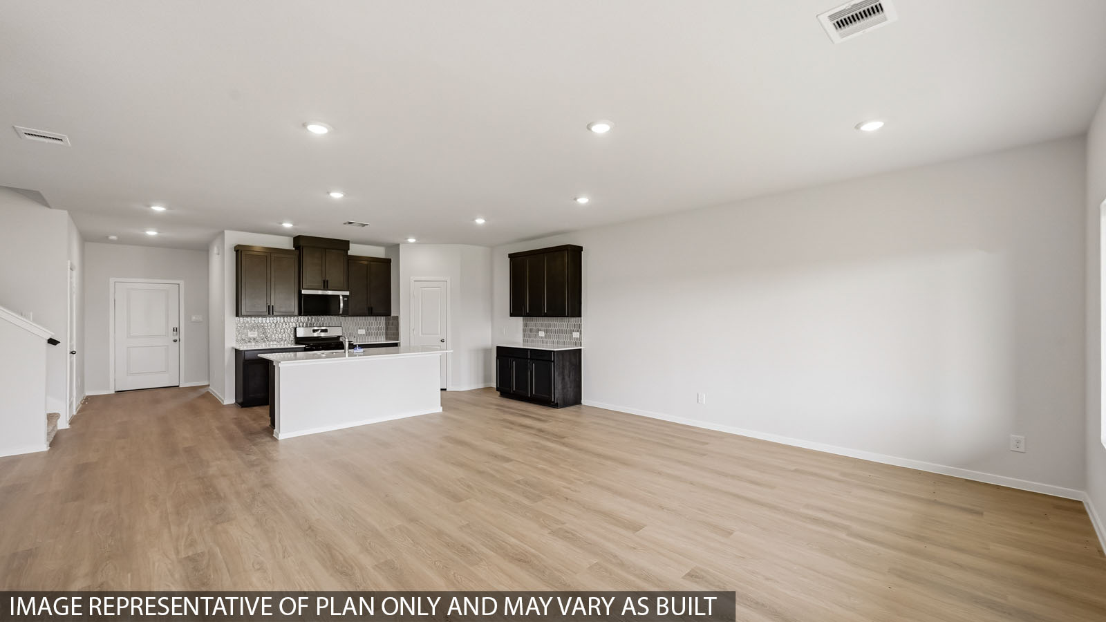 open concept living and dining area with vinyl flooring and large windows