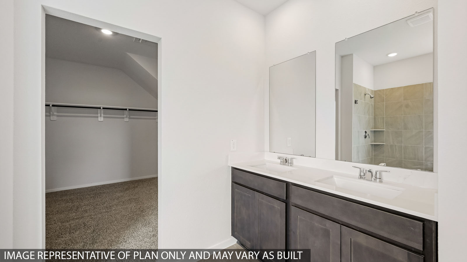 primary bathroom with separate tub and shower