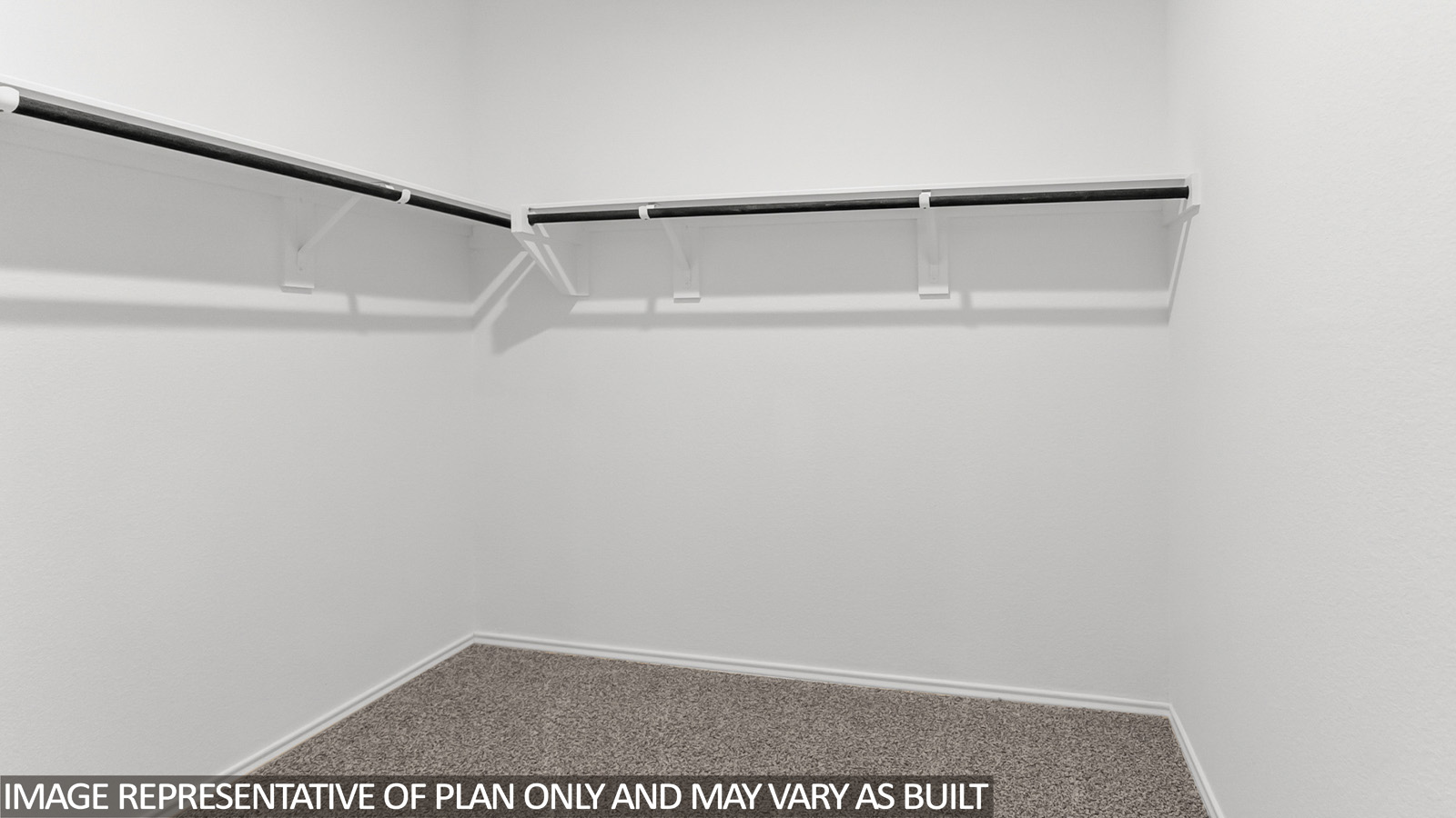 Primary bathroom with a walk-in shower, dual sinks, light gray cabinets, white countertops,vinyl wood flooring, and white walls.