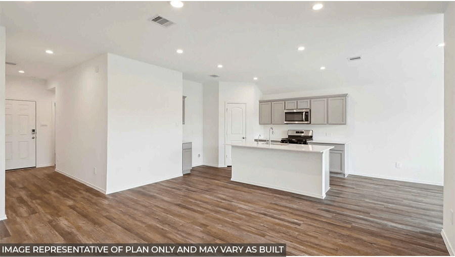 Open kitchen with an island, stainless steel appliances, light gray cabinets, white walls, and vinyl wood flooring.