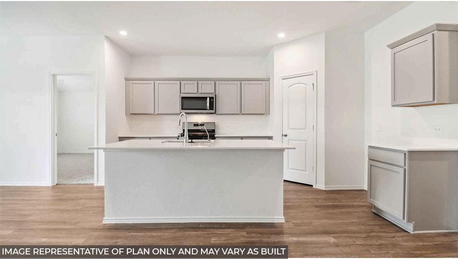 Open kitchen with stainless steel appliances, an island, light gray cabinets, white countertops, white walls, and vinyl wood flooring.