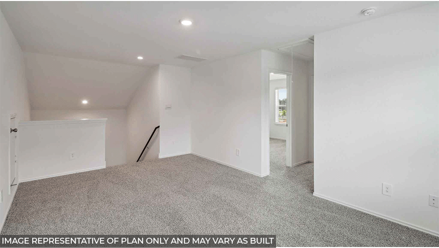 Game room with windows, white walls, and light carpet.