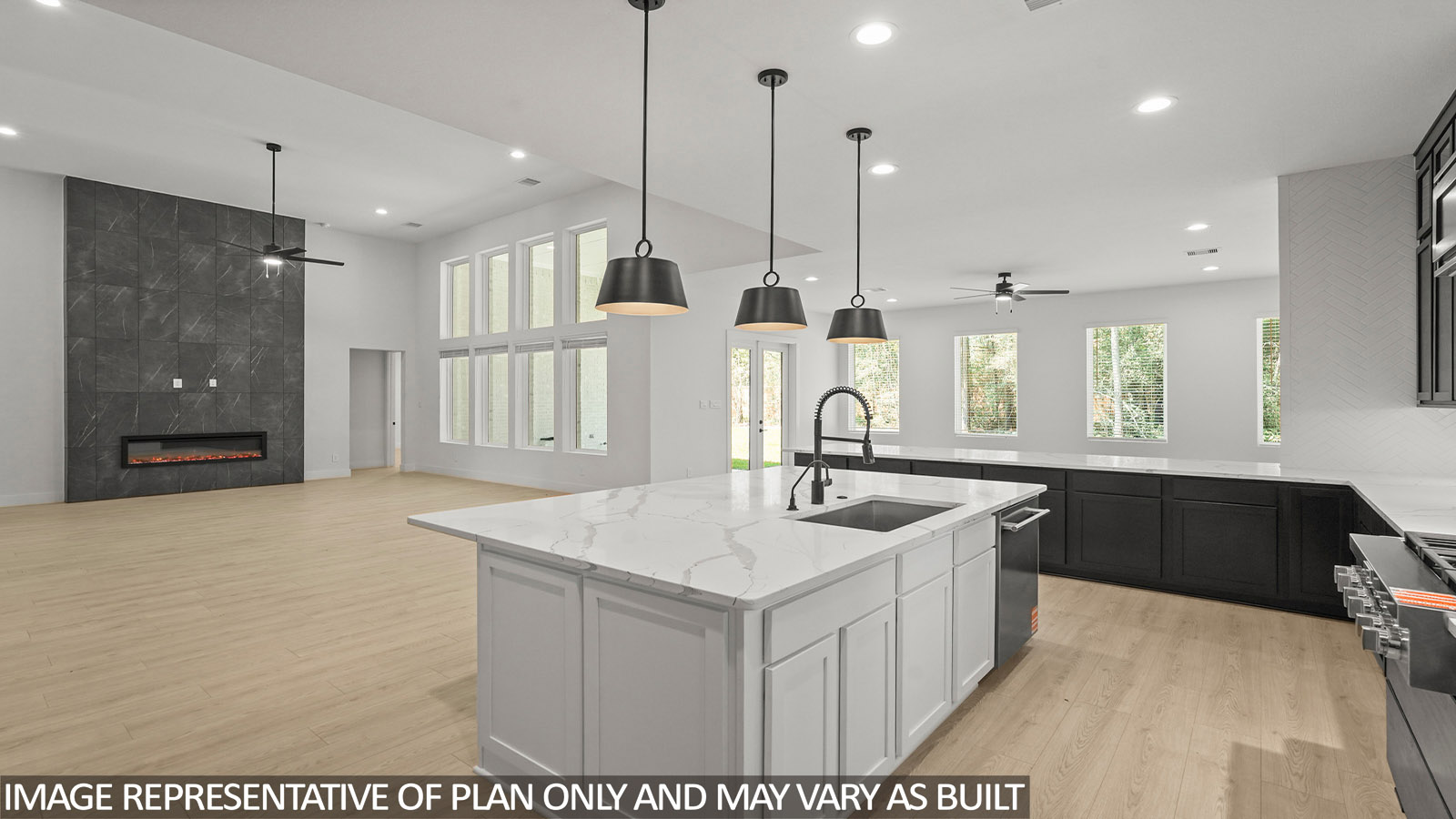 L- shaped kitchen with an island and quartz counter topsL- shaped kitchen with an island and quartz counter tops