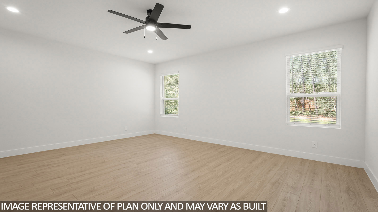 Large Primary bedroom with ceiling fan, vinyl flooring and bright window