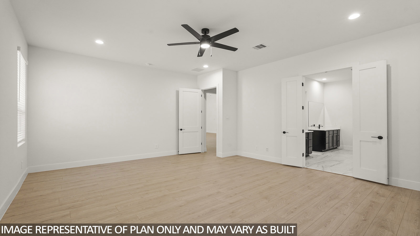 Large Primary bedroom with ceiling fan, vinyl flooring and bright window