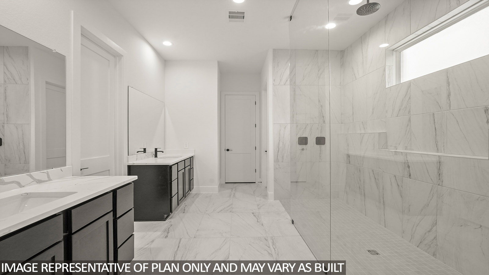 Primary bathroom with double sinks with quartz counter tops and tile floor in Pinehurst TX