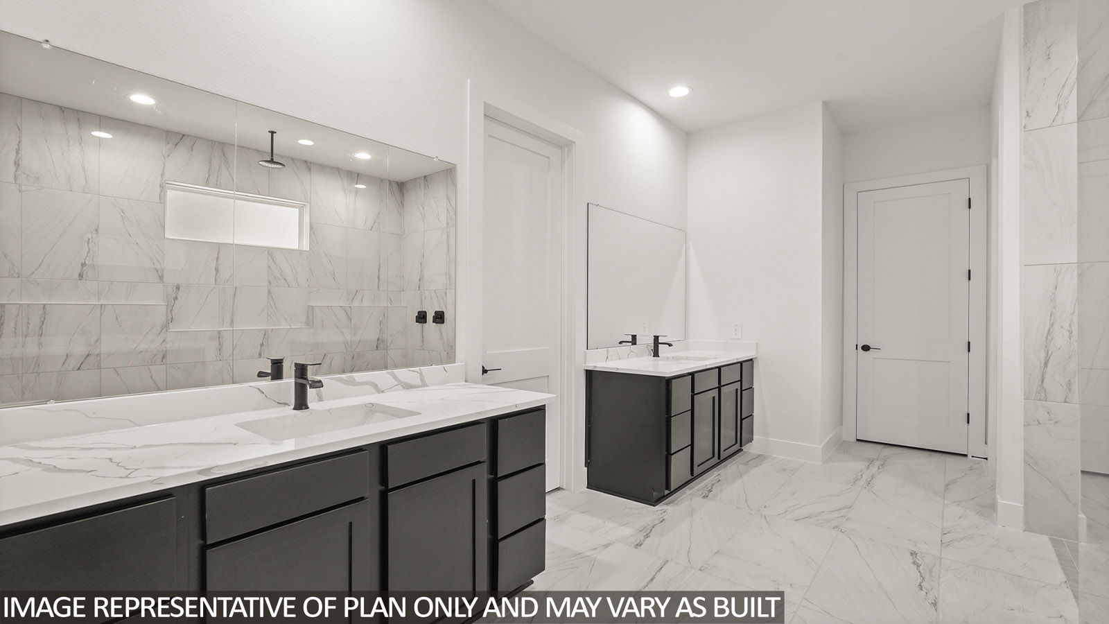 Primary bathroom with double sinks with quartz counter tops and tile floor in Pinehurst TX