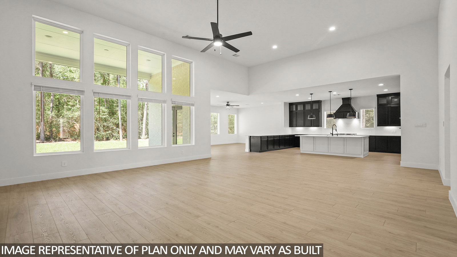 One story home with two car garage with brick and siding in New Waverly TX