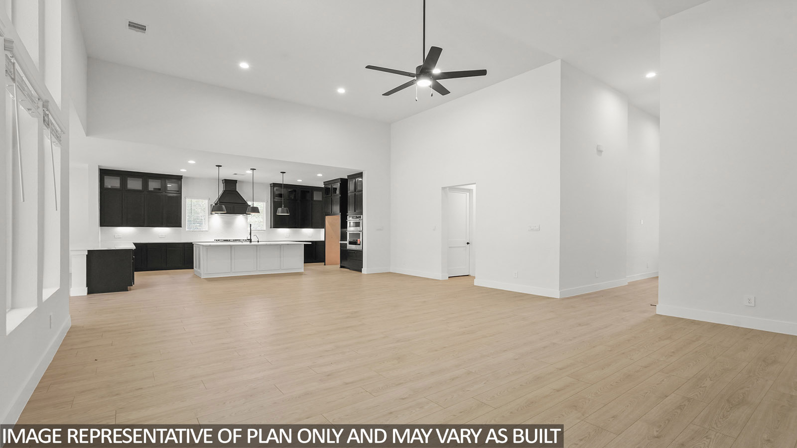 One story home with two car garage with brick and siding in New Waverly TX