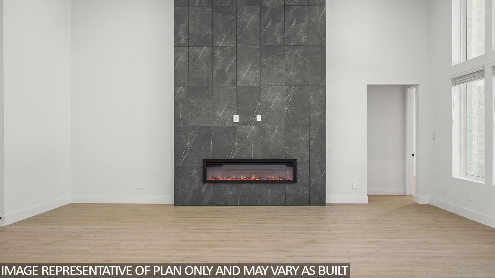 Stunning floor to ceiling fireplace with tile facade