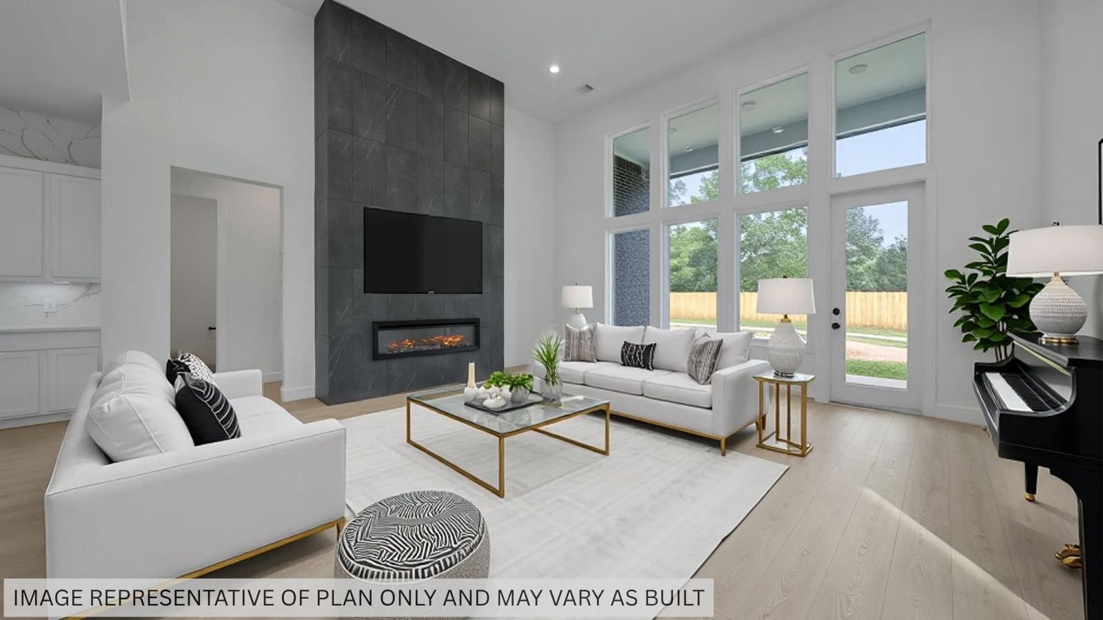 Spacious living area with vinyl flooring