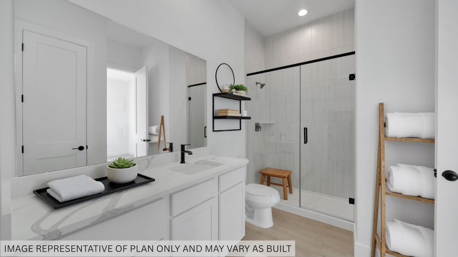 Secondary bathroom with stand alone shower and double sinks