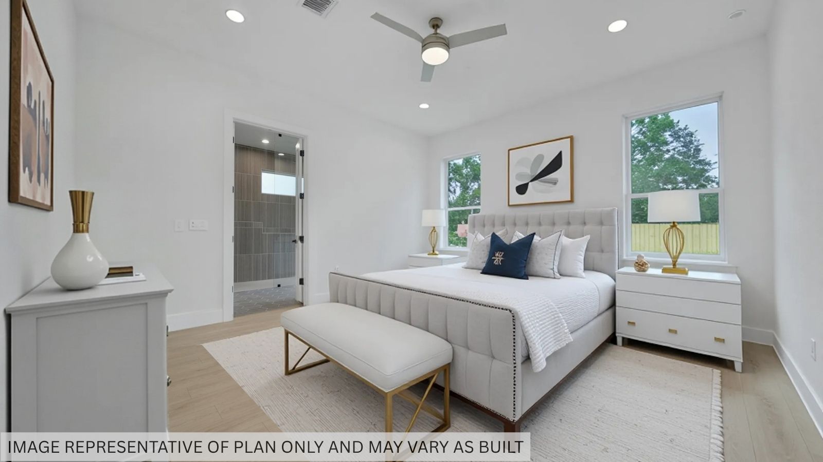 Secondary bedroom with carpet flooring