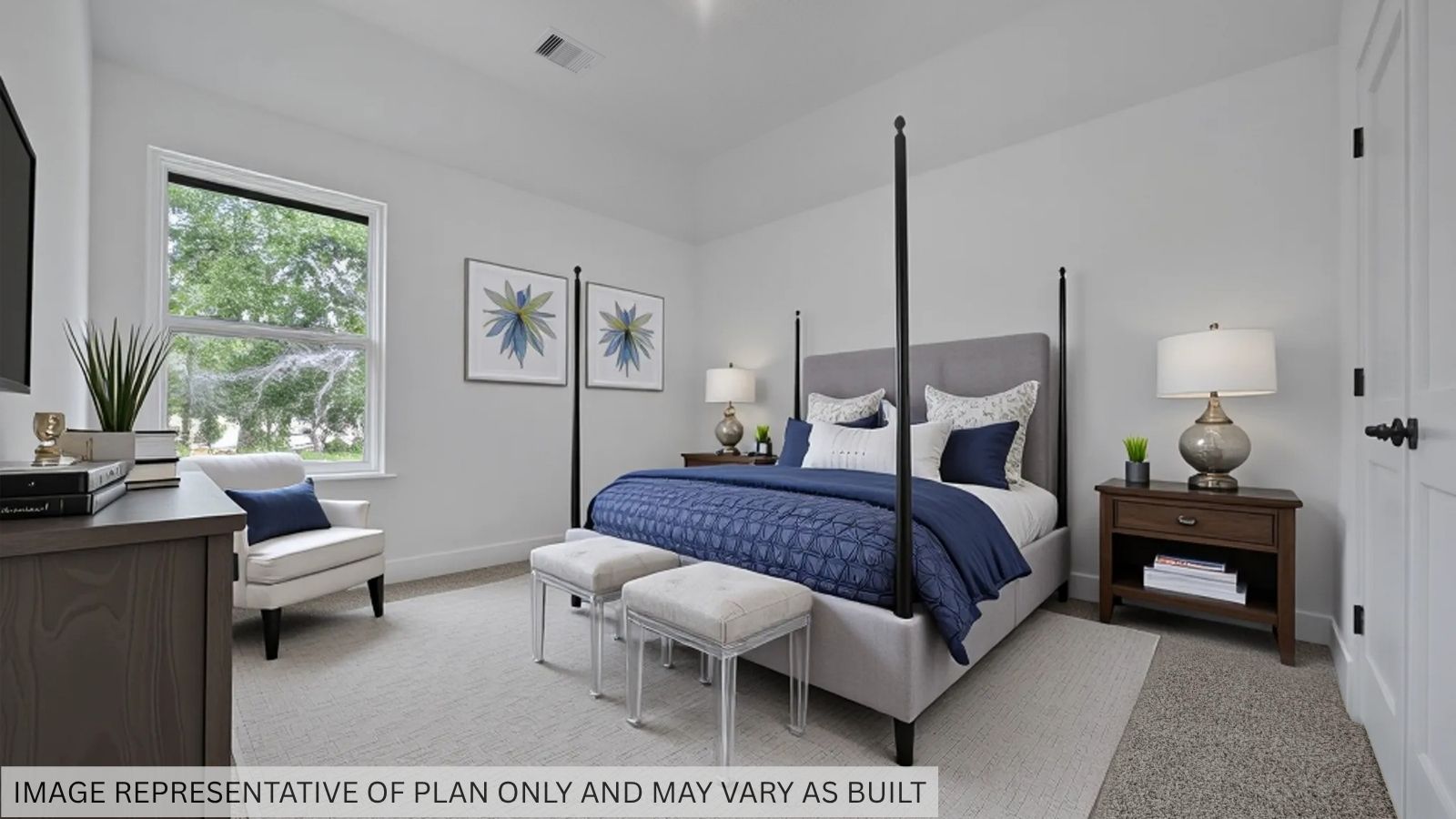 Secondary bedroom with carpet flooring