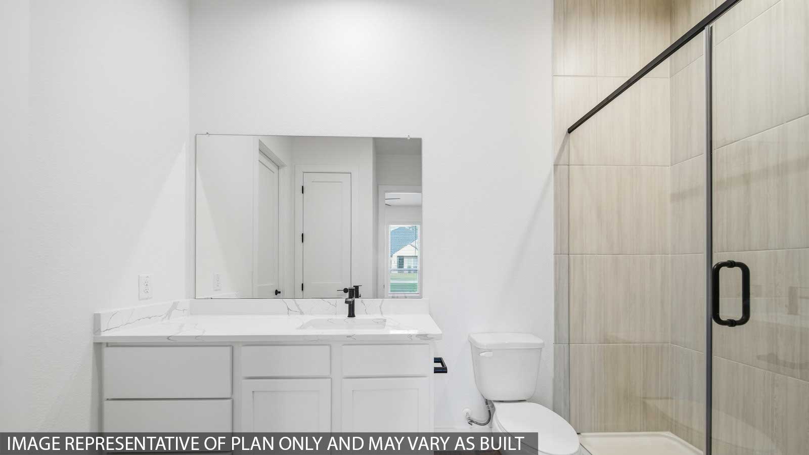 Primary bathroom with stand-alone shower with tiles and semi frameless glass in Pinehurst TX
